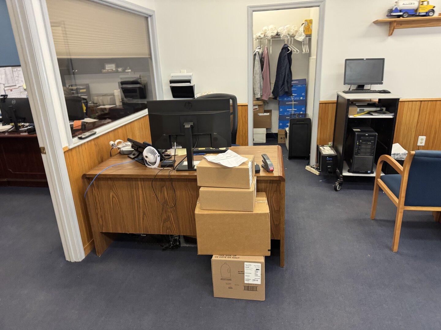 Office desk and equipment ready for commercial move in Camden County by Maloney's Moving